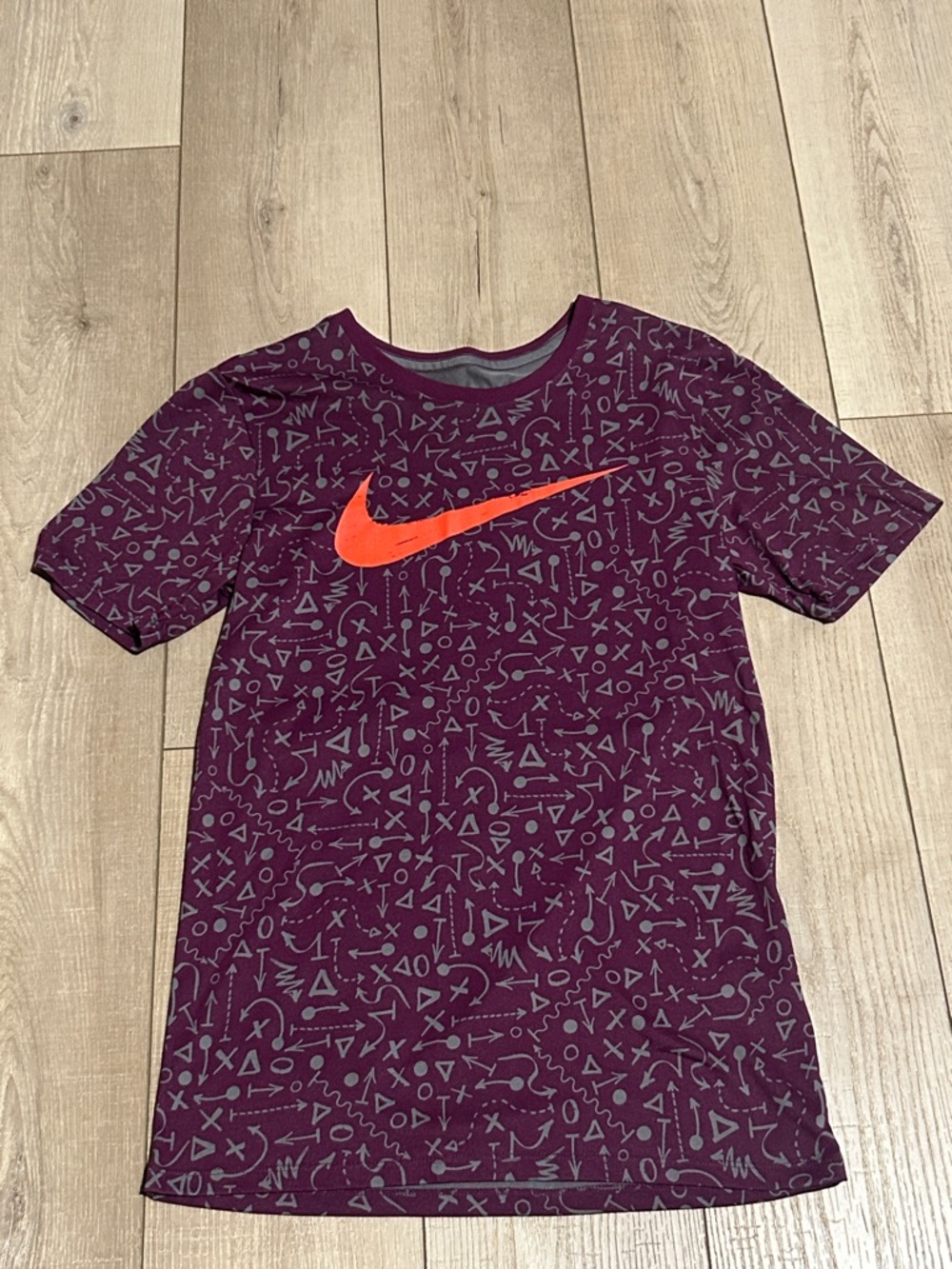 Nike Men's Purple Graphic Short Sleeve Tee with Orange Swoosh